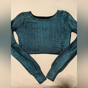 Bebe aqua colored shiny long sleeved crop top
